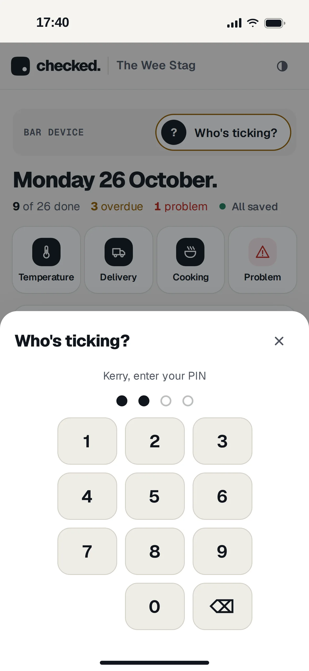 Kerry entering a four-digit PIN on the bar device